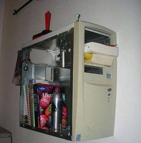 Repurposing: an old computer case reused as bookshelve