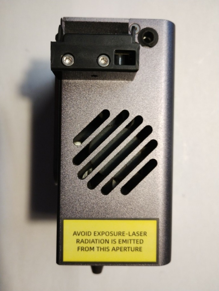 tete laser fan gauche